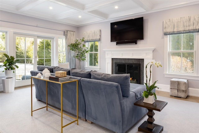 living room with coffered ceiling, beamed ceiling, and light wood-type flooring