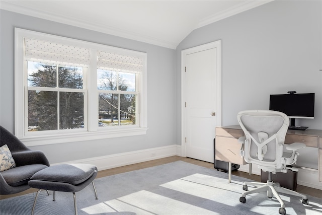 office with crown molding, vaulted ceiling, and light wood-type flooring