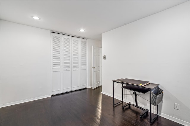 interior space with dark hardwood / wood-style floors