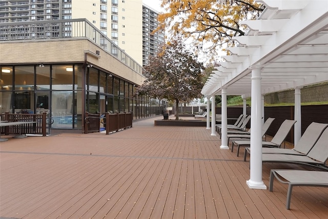 wooden deck with a pergola