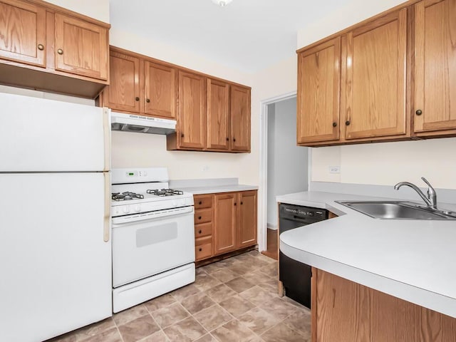 kitchen with white appliances and sink