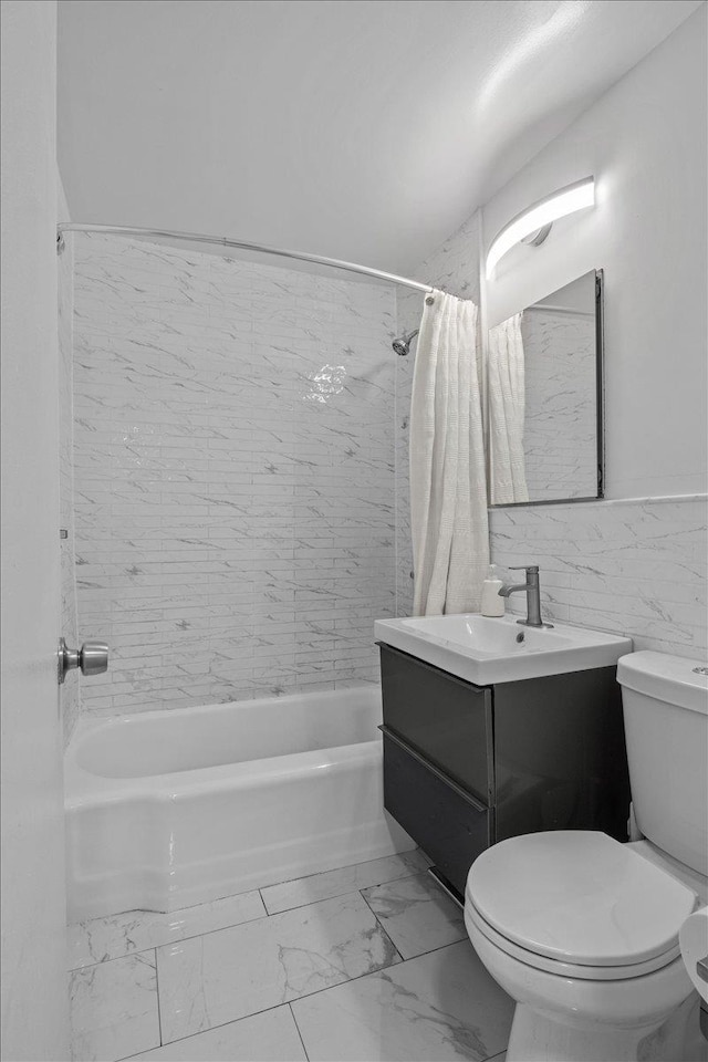 full bathroom featuring vanity, toilet, tile walls, and shower / bath combo with shower curtain