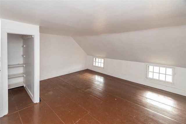 bonus room featuring lofted ceiling