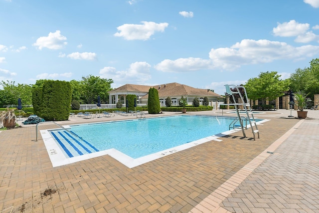 view of pool featuring a patio area