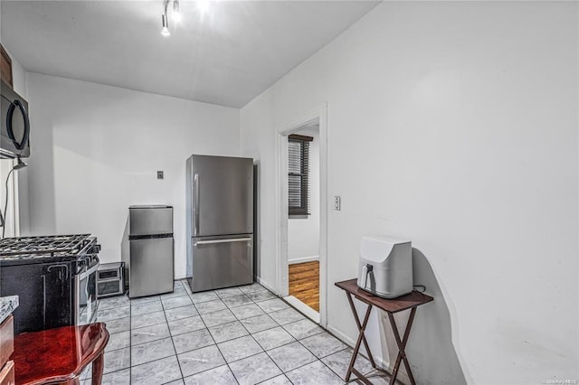 kitchen with stainless steel refrigerator