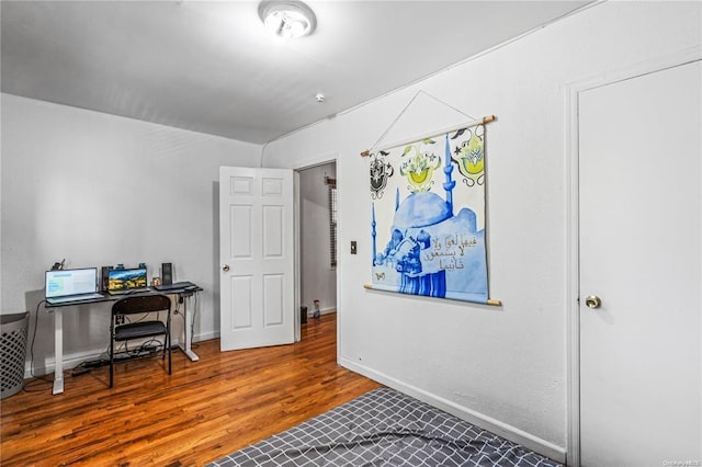 office space with hardwood / wood-style flooring