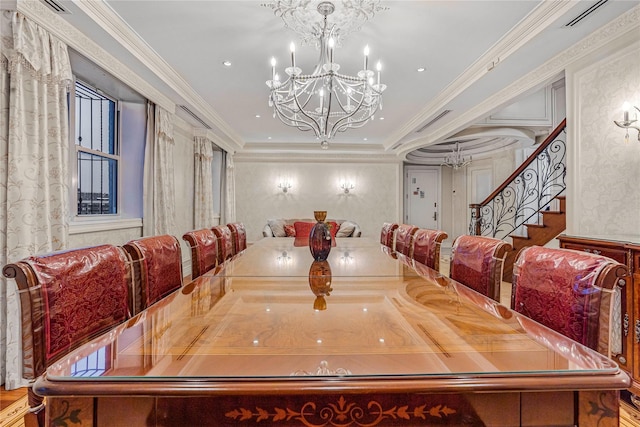 dining room featuring an inviting chandelier and ornamental molding