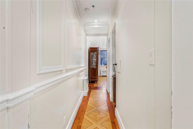 corridor featuring crown molding