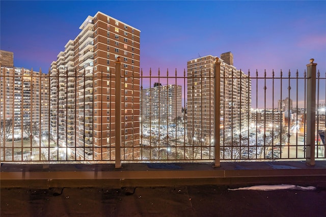 view of outdoor building at dusk