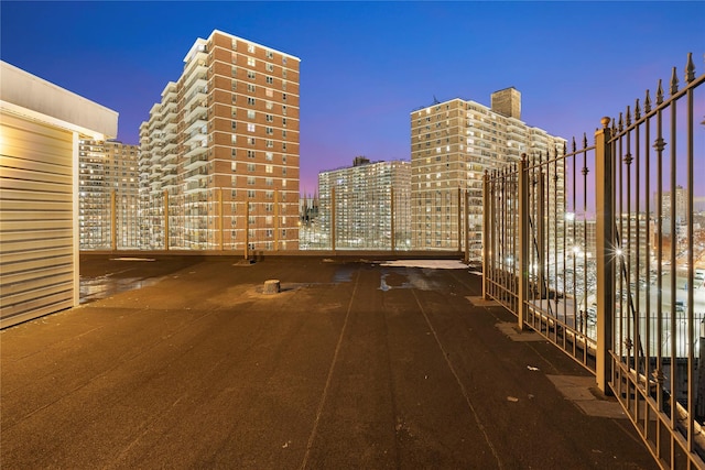 view of patio terrace at dusk