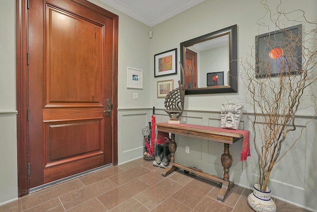 foyer entrance with ornamental molding