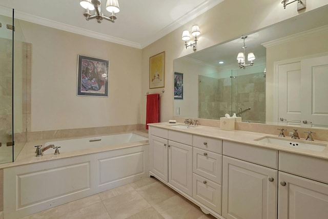 bathroom with tile patterned floors, vanity, separate shower and tub, and a chandelier