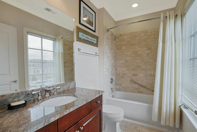 full bathroom with toilet, shower / bath combo with shower curtain, vanity, and tile patterned flooring