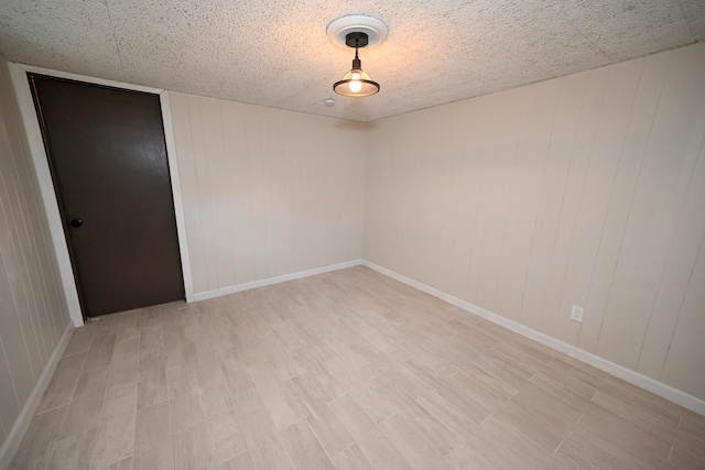 empty room featuring light hardwood / wood-style flooring