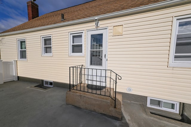 entrance to property with a patio area