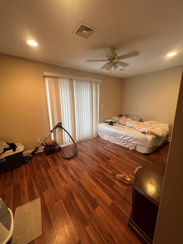 bedroom featuring hardwood / wood-style floors and ceiling fan