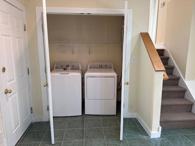 washroom with independent washer and dryer