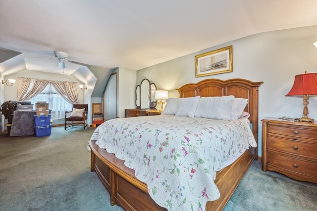 bedroom featuring ceiling fan, carpet floors, and vaulted ceiling