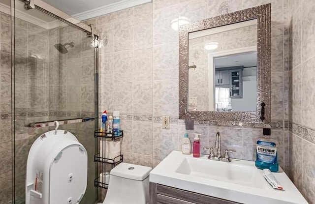 bathroom with walk in shower, ornamental molding, vanity, tile walls, and toilet