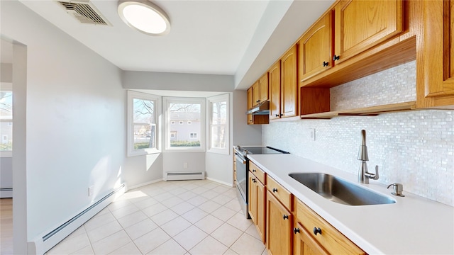 kitchen with tasteful backsplash, a baseboard radiator, sink, and stainless steel range with electric stovetop