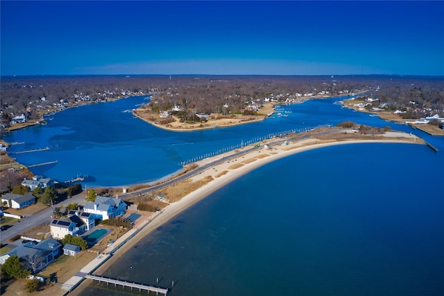 aerial view with a view of the beach and a water view