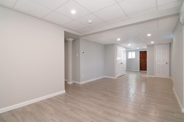 empty room featuring a drop ceiling