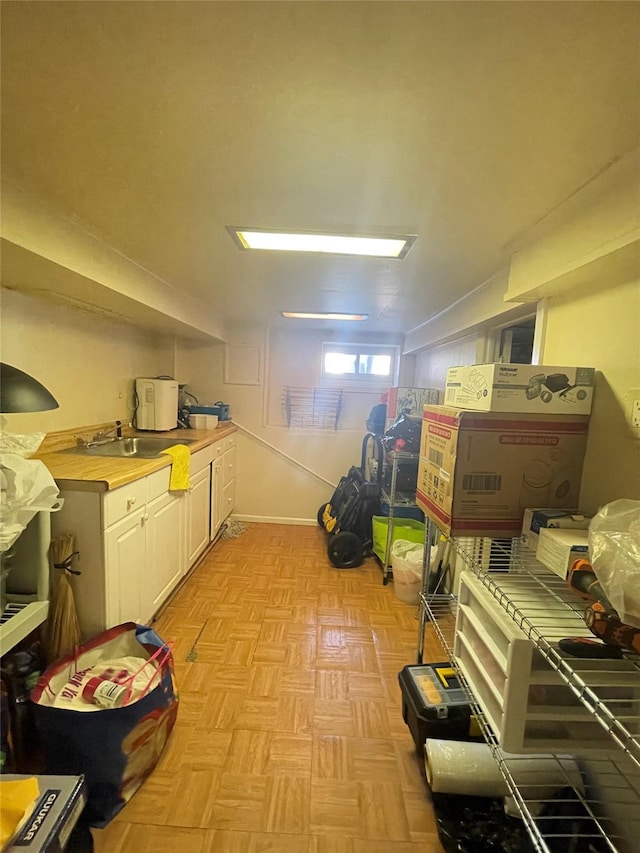 interior space featuring light parquet flooring and sink