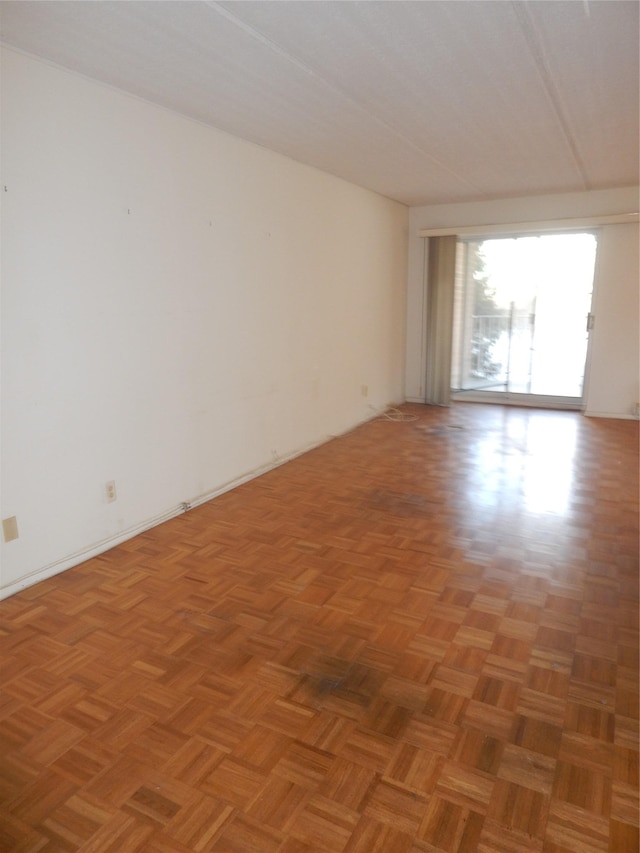 empty room featuring light parquet flooring