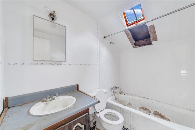 full bathroom featuring vanity, toilet, and tub / shower combination