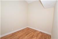 empty room with hardwood / wood-style flooring