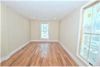 spare room featuring light hardwood / wood-style floors