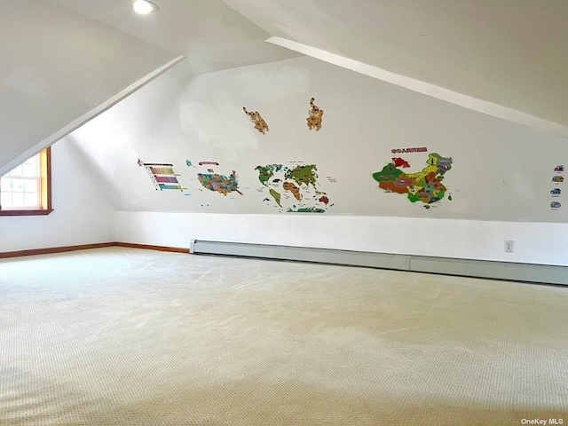 additional living space featuring carpet flooring and lofted ceiling