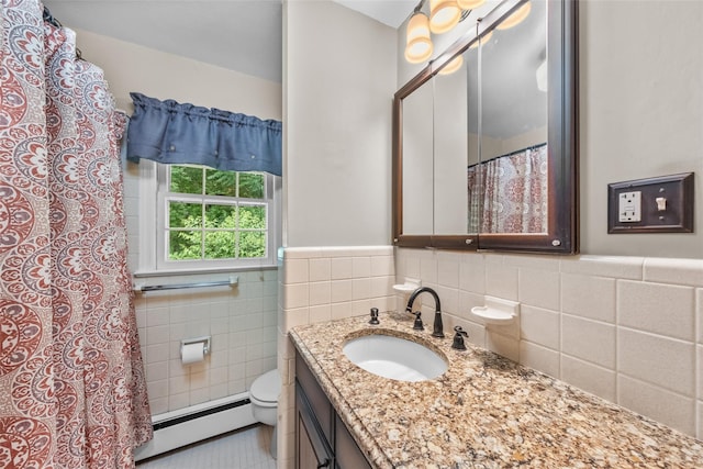 17 Walnut Hill Rd, Poughkeepsie, NY 12603 - full bath with a baseboard heating unit, tile walls, vanity, wainscoting, and tile patterned flooring
