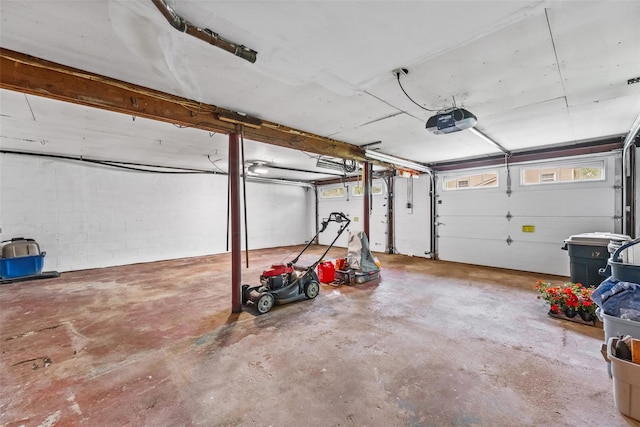 17 Walnut Hill Rd, Poughkeepsie, NY 12603 - garage with a garage door opener and concrete block wall