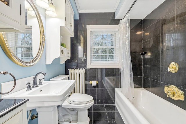 full bathroom featuring radiator heating unit, shower / bathtub combination with curtain, tile patterned floors, toilet, and tile walls