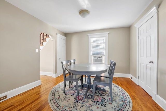 dining space featuring light wood-type flooring