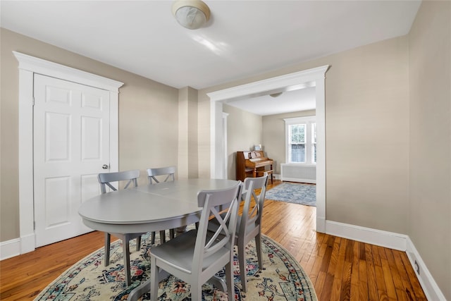 dining room featuring hardwood / wood-style flooring