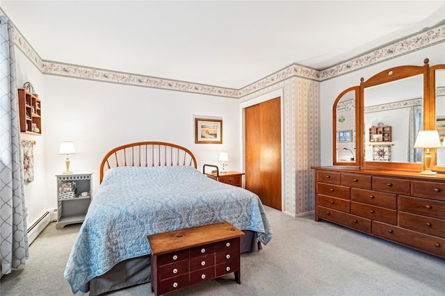 bedroom with light colored carpet and a baseboard radiator