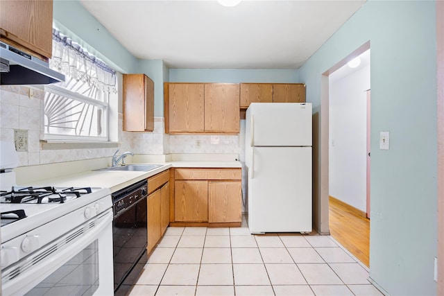 kitchen with sink, tasteful backsplash, white appliances, light tile patterned flooring, and exhaust hood