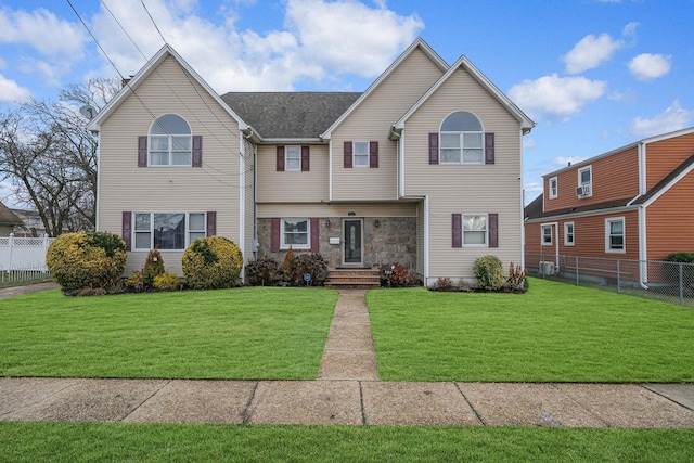 view of front of property with a front lawn