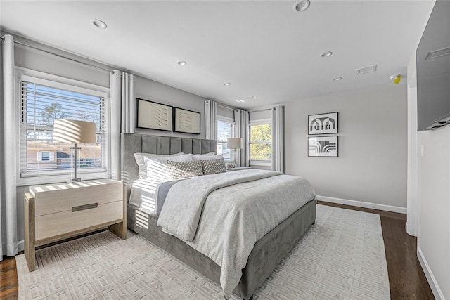 bedroom featuring wood-type flooring