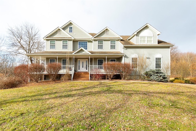 view of front of property featuring covered porch and a front yard