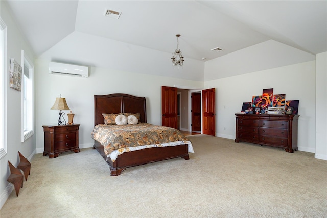 carpeted bedroom with a notable chandelier, lofted ceiling, and a wall unit AC