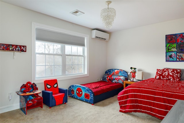 bedroom with carpet floors and a wall unit AC