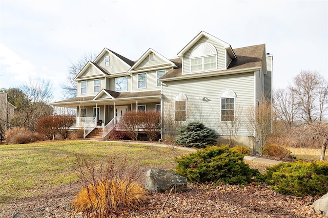 view of front of home featuring a porch and a front lawn