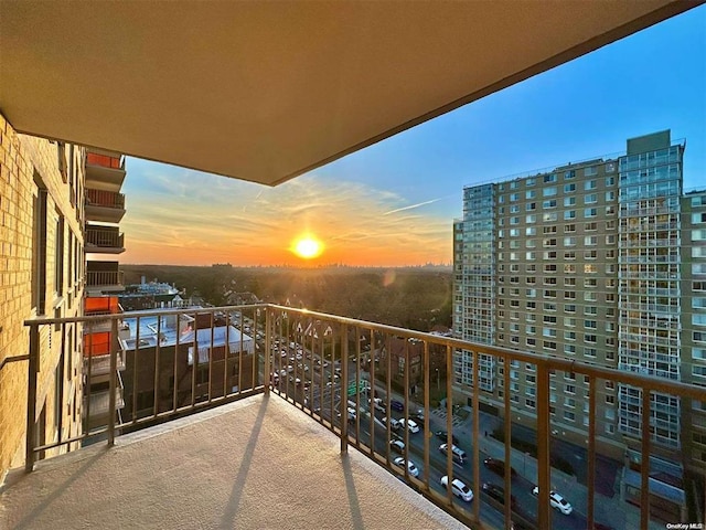 view of balcony at dusk