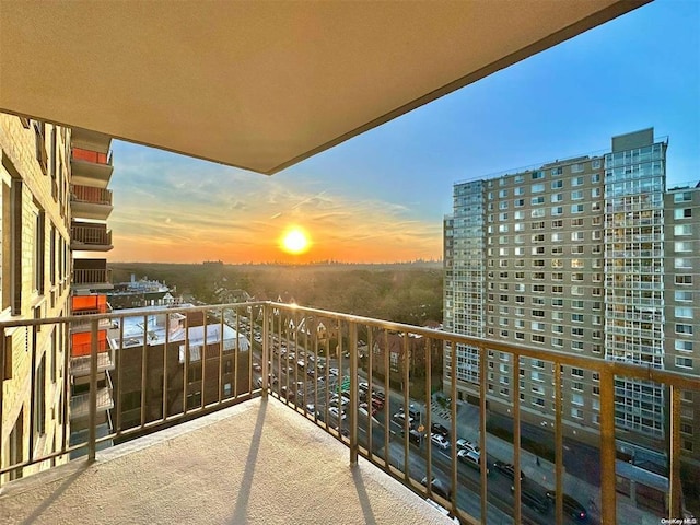 view of balcony at dusk