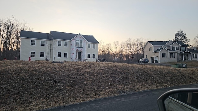 view of front of house with a residential view