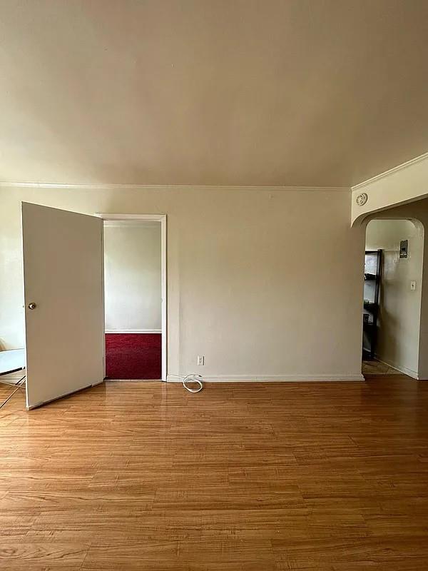 unfurnished room featuring light wood-type flooring