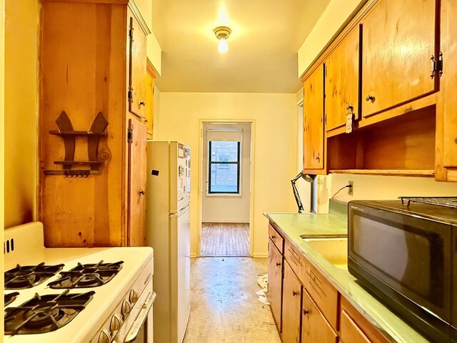 kitchen featuring white appliances